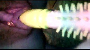 play Laura inserts a red dildo into her pussy